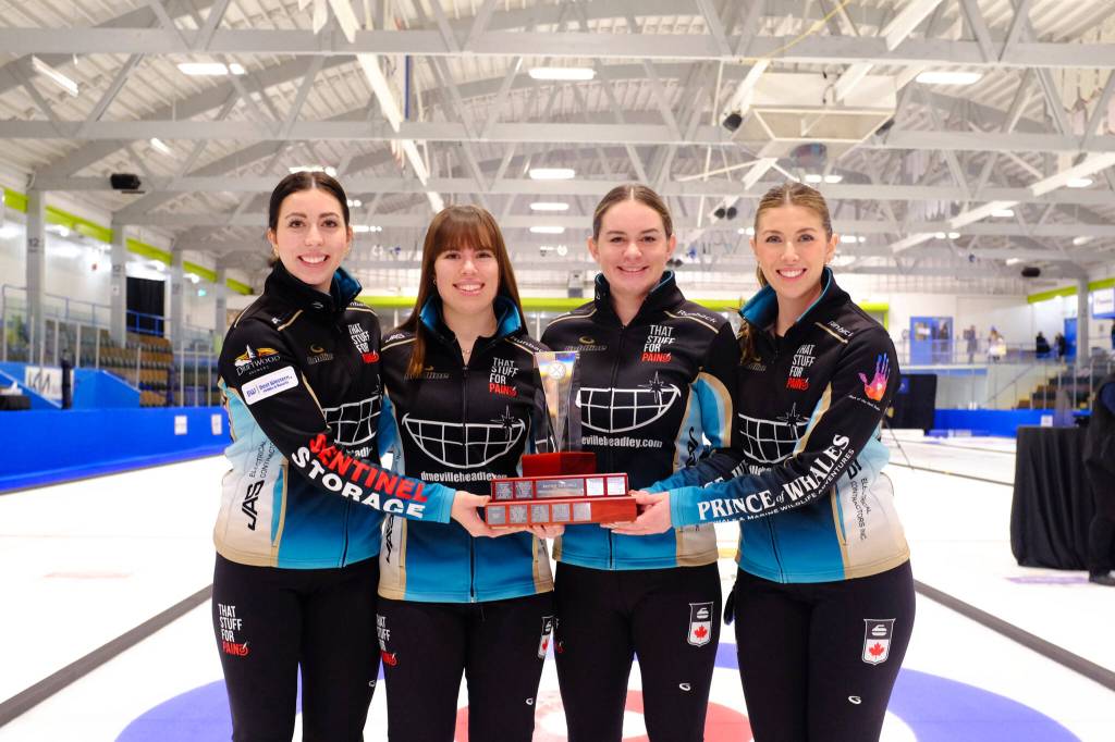 (L-R) Julianna Mackenzie, Kim Bonneau, Megan McGillivray and Taylor Reese-Hansen pose after their win at the 2026 B.C. Women&rsquo;s Curling Championship finals. (Olivier Laurin/Victoria News)